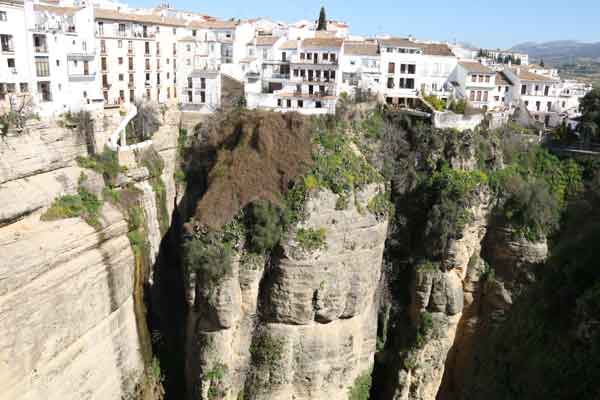 Kaw dropping Ronda ancient gorge in Andalucía, Spain