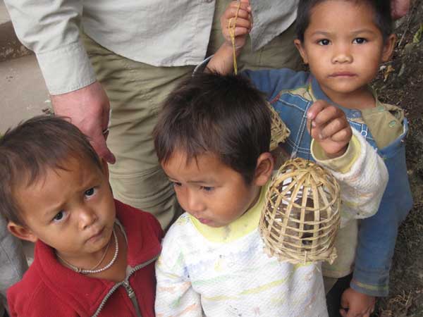 Children selling birds
