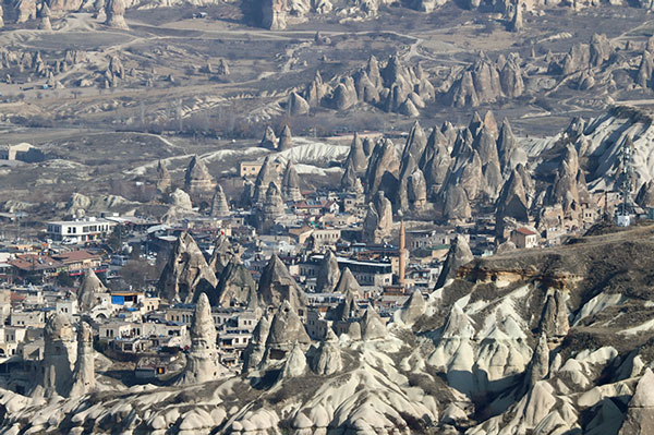 Tombs and temples carved in rock formations 0083w